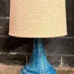 blue and tan shade lamp